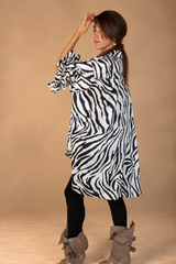 Chemise longue à manches bouffantes  – Femme